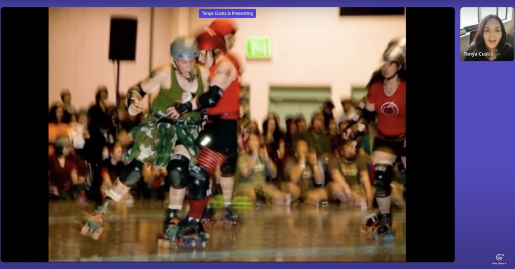 Screenshot of a slide by Dr. Tonya Custis (Director of AI Research at Autodesk). In the slide, there's a photo of Dr. Custis playing roller derby. 