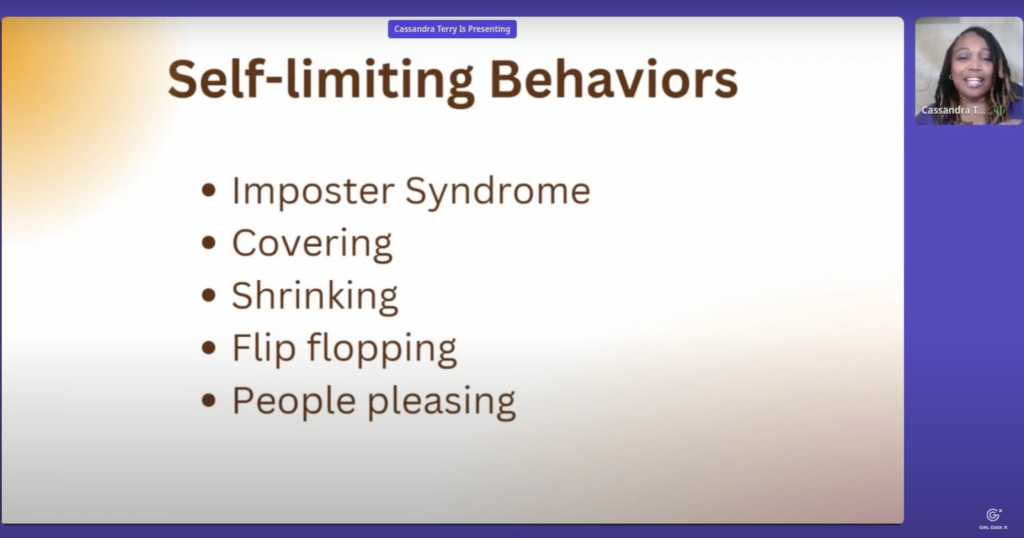 Slide from Cassandra Terry's talk. 

The title is "self limiting behaviors."  

Below that, she lists 5 behaviors: 
imposter syndrome, covering, shrinking, flip flopping, and people pleasing. 

To the right is a small image of Cassandra captured during her live presentation.